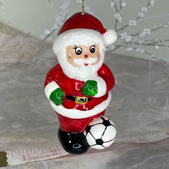 Vintage 1980’s hand painted Santa kicking a soccer ball. - Picture 1 of 9